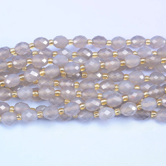 Faceted rice barrel cut gray agate beads