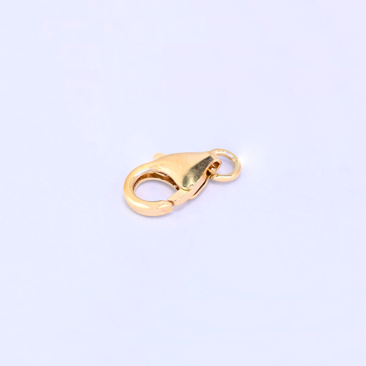 14K gold filled lobster clasp, 6x10mm, diagonal view showing the hinge from underneath, jump ring at the right