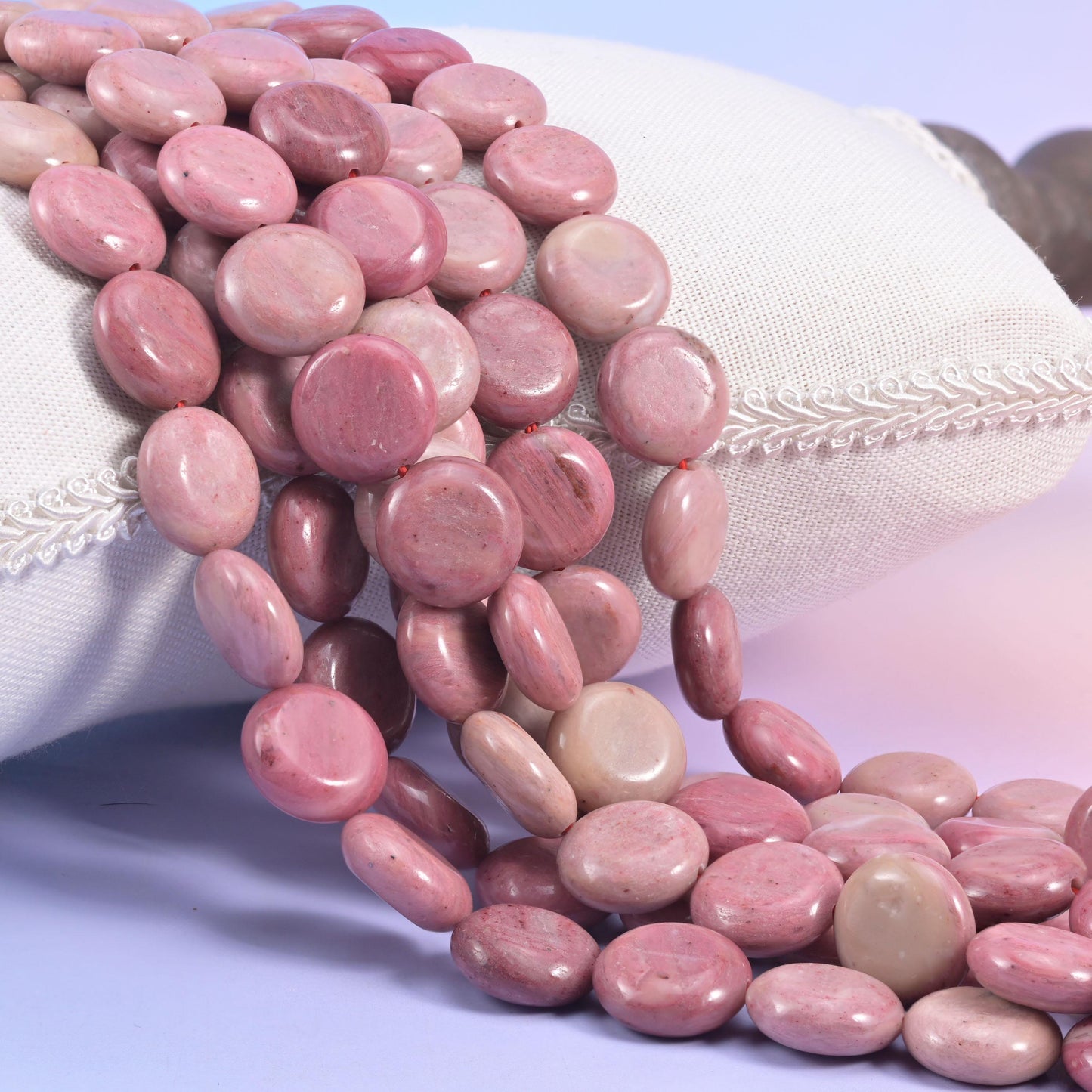 Natural Pink Rhodonite smooth coin beads in dusty rose clouded with oatmeal cream and soft mauve