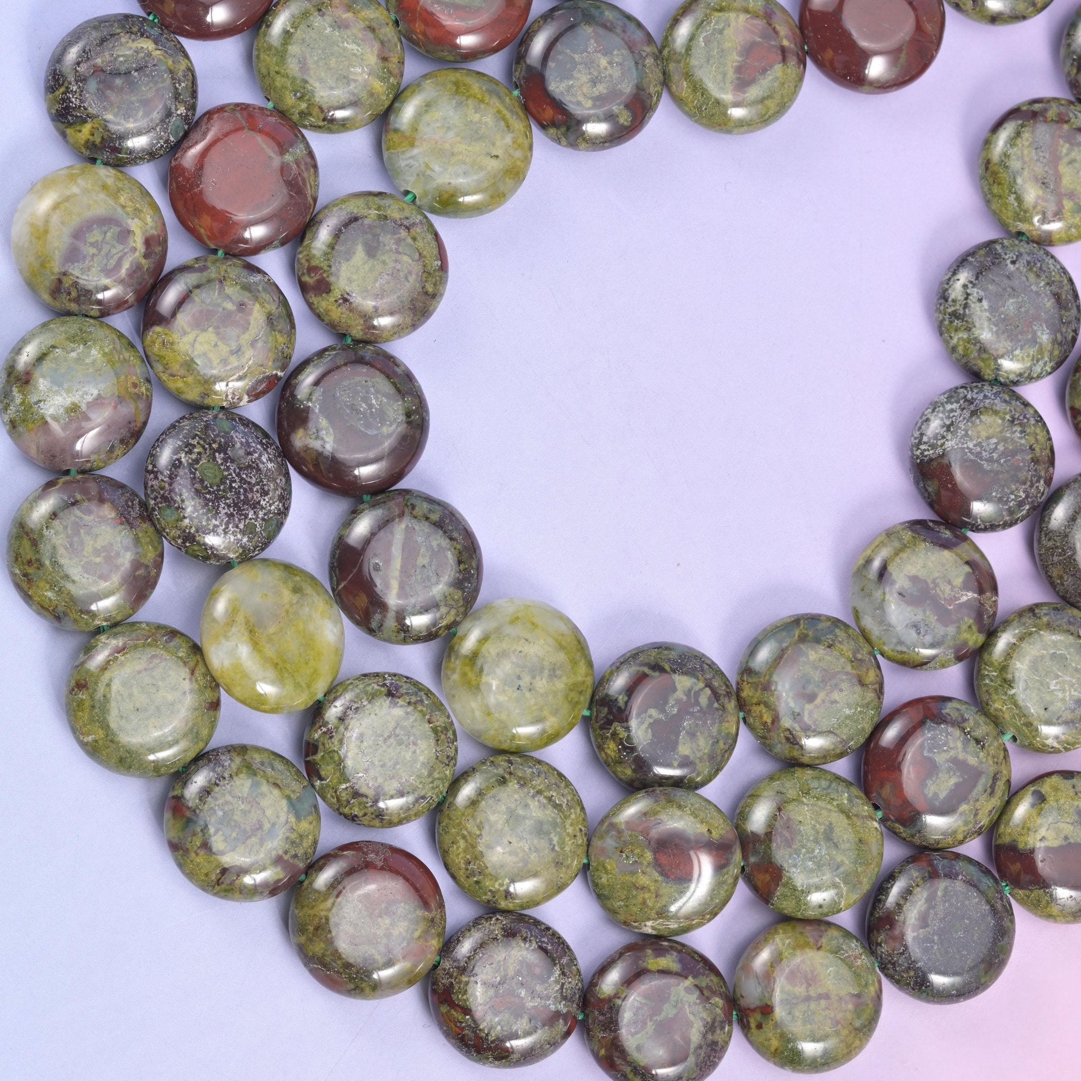Dragon bloodstone coin beads, approximately 26 beads per strand