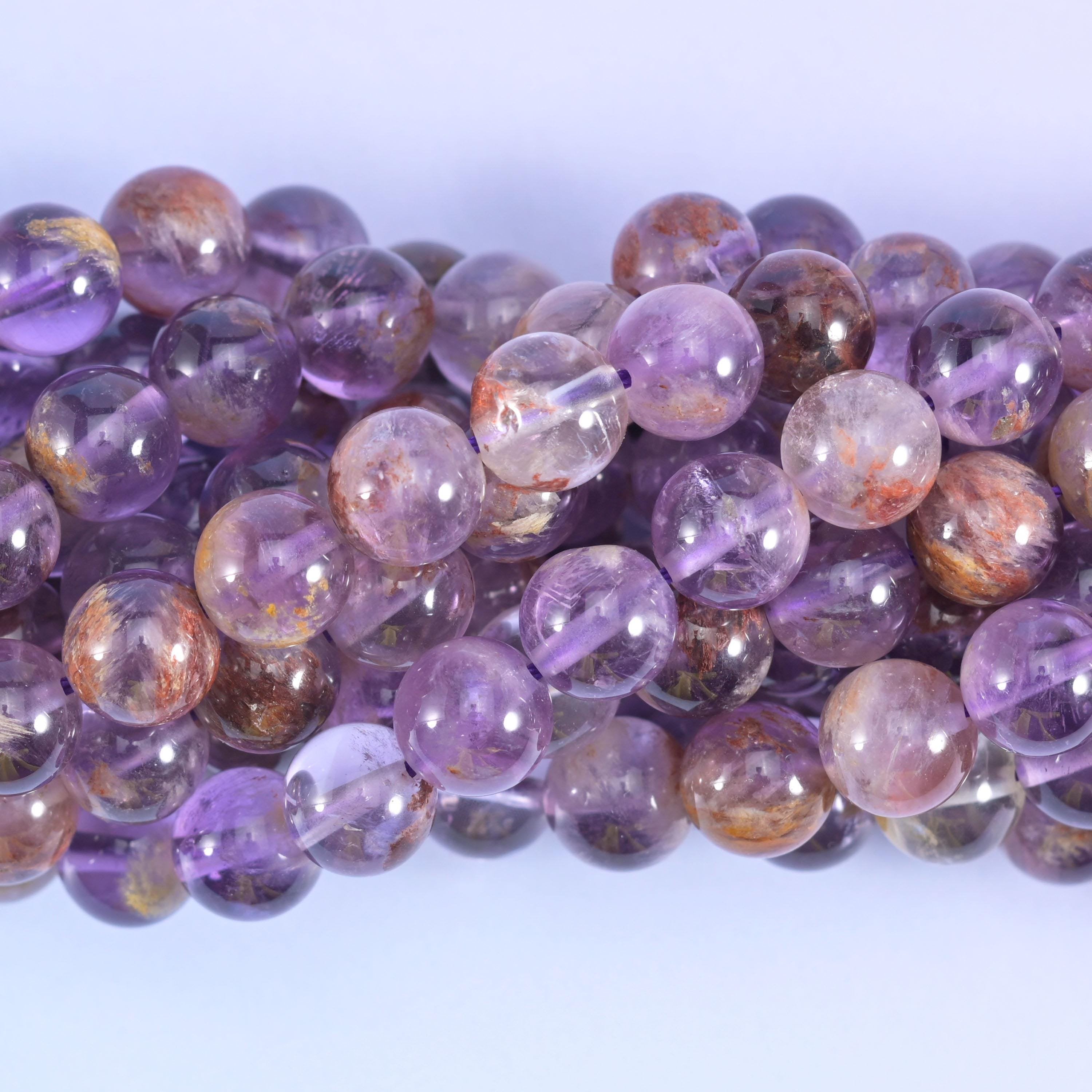 Super 7 purple phantom round beads, centre-drilled hole approximately 1.0mm