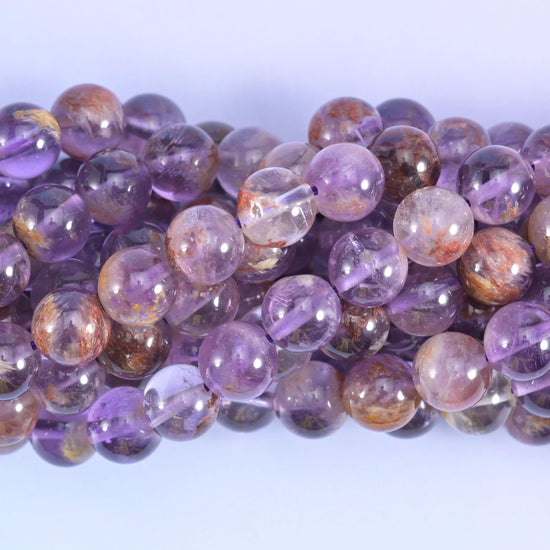 Super 7 purple phantom round beads, centre-drilled hole approximately 1.0mm