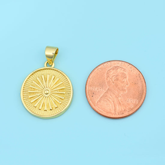 A round disc engraved with fine rays fanning out from a raised centre point, the reverse left plain and slightly textured,…