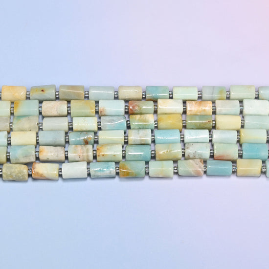 Side view of Multi-Color Amazonite faceted tube beads laid straight in two rows, showing the flat polished planes and brown and orange markings