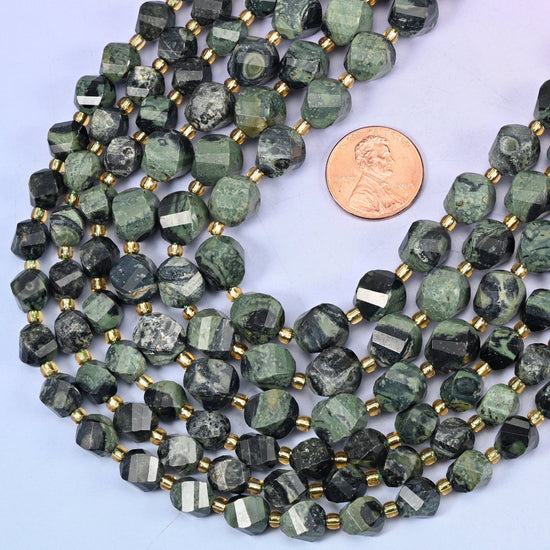 Faceted spiral twist cut Kambaba Jasper beads