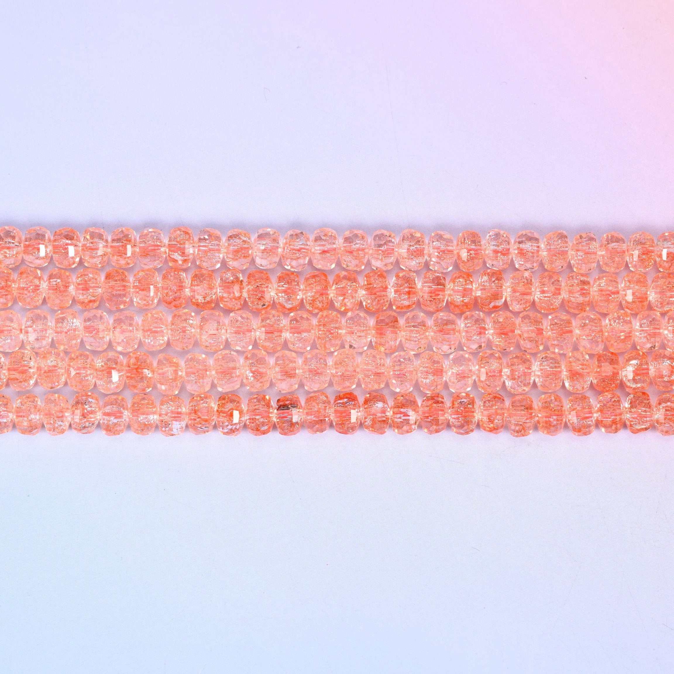 Transparent Orange Faceted Rondelle Glass Beads in soft peachy coral