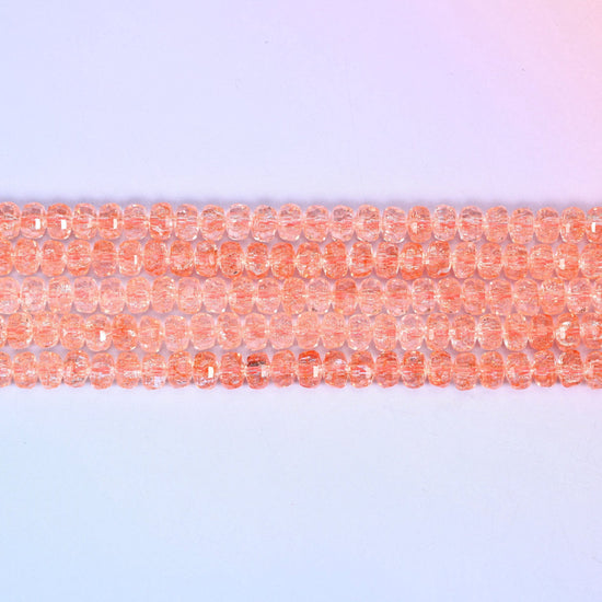 Transparent Orange Faceted Rondelle Glass Beads in soft peachy coral