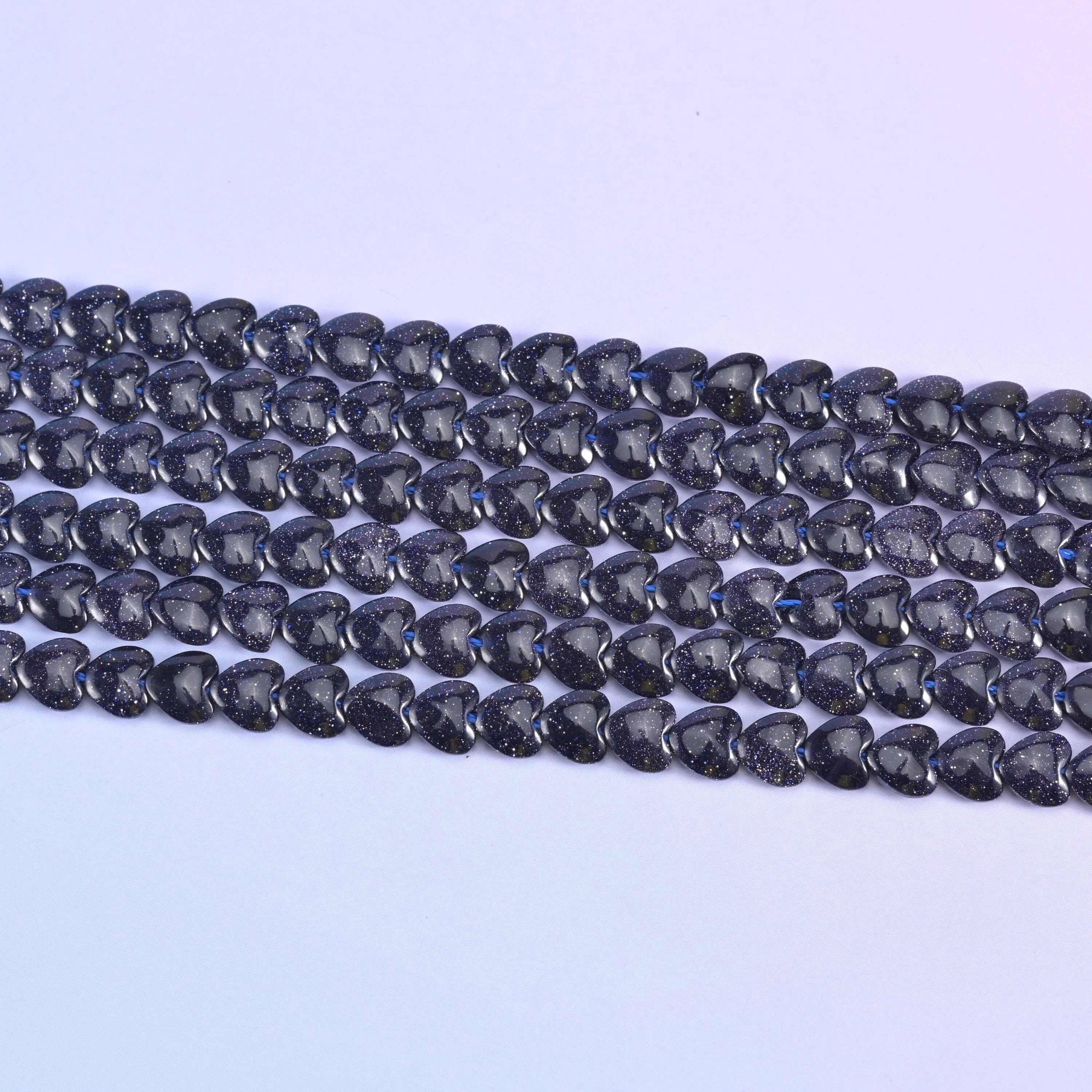 Blue Sandstone Heart Beads 6mm in deep midnight blue with dense copper glitter flecks
