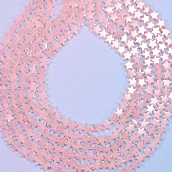Flat star cut rose quartz beads