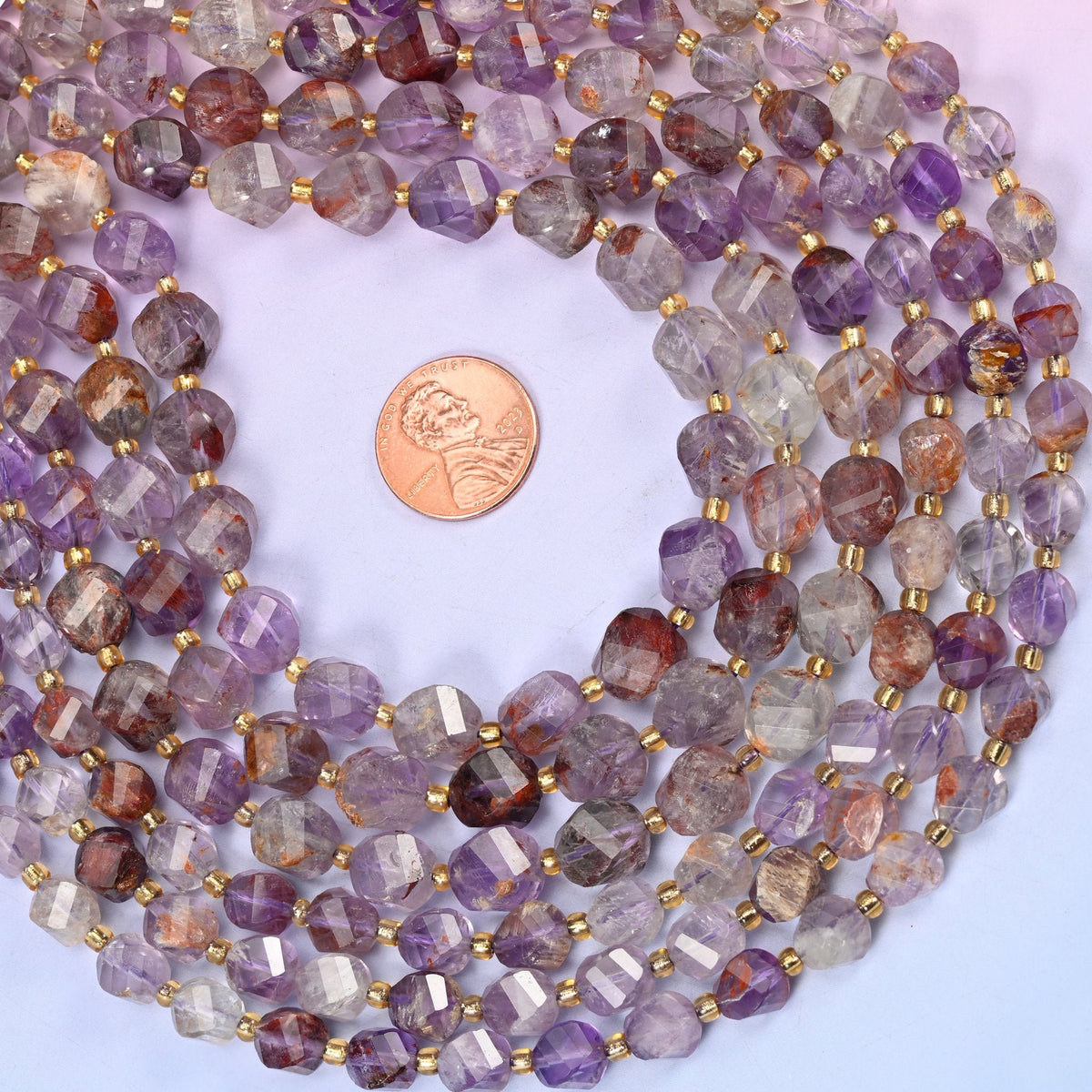 Cloudy quartz with pale amethyst purple, milky white and reddish-brown mineral inclusions