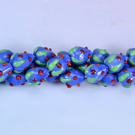 Glossy cobalt blue glass strawberries for jewelry making