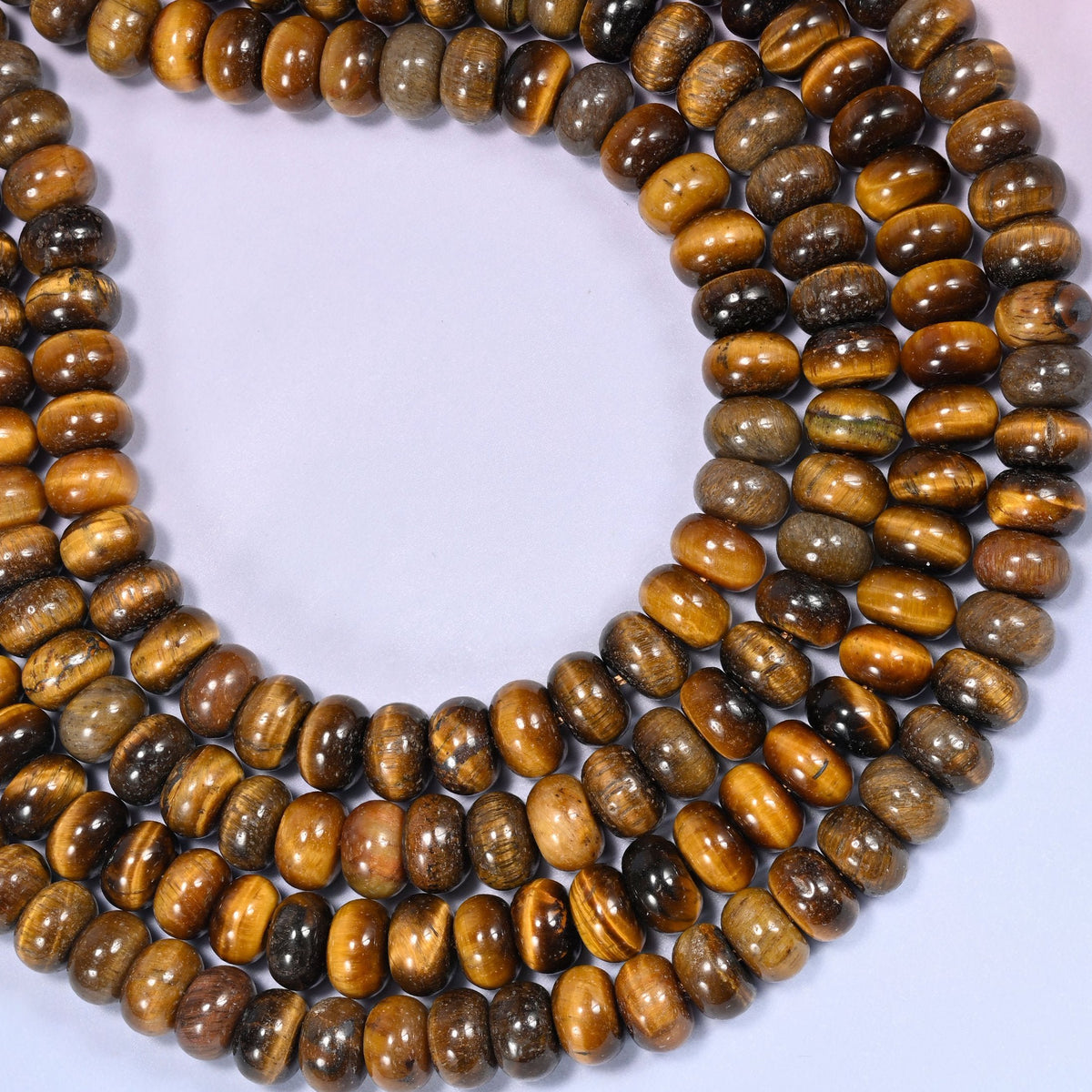 Natural Tiger's Eye Rondelle Beads with a large 2.5mm centrally drilled hole.