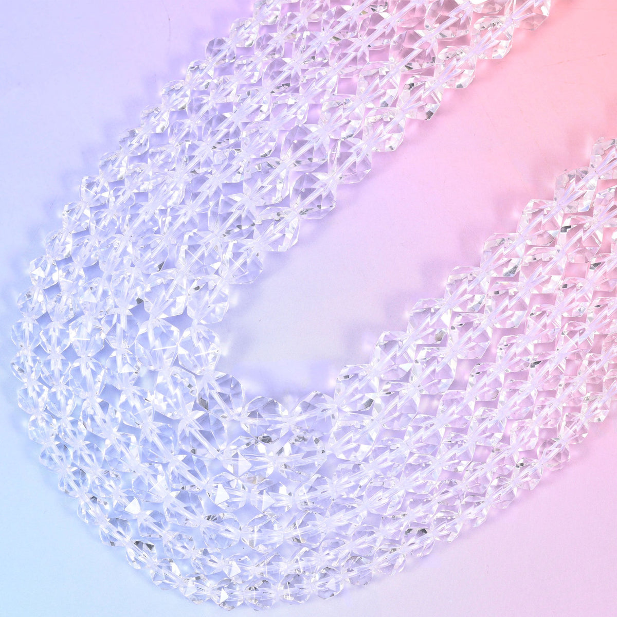 Clear Quartz diamond star cut beads, two 15.5 inch strands crossing