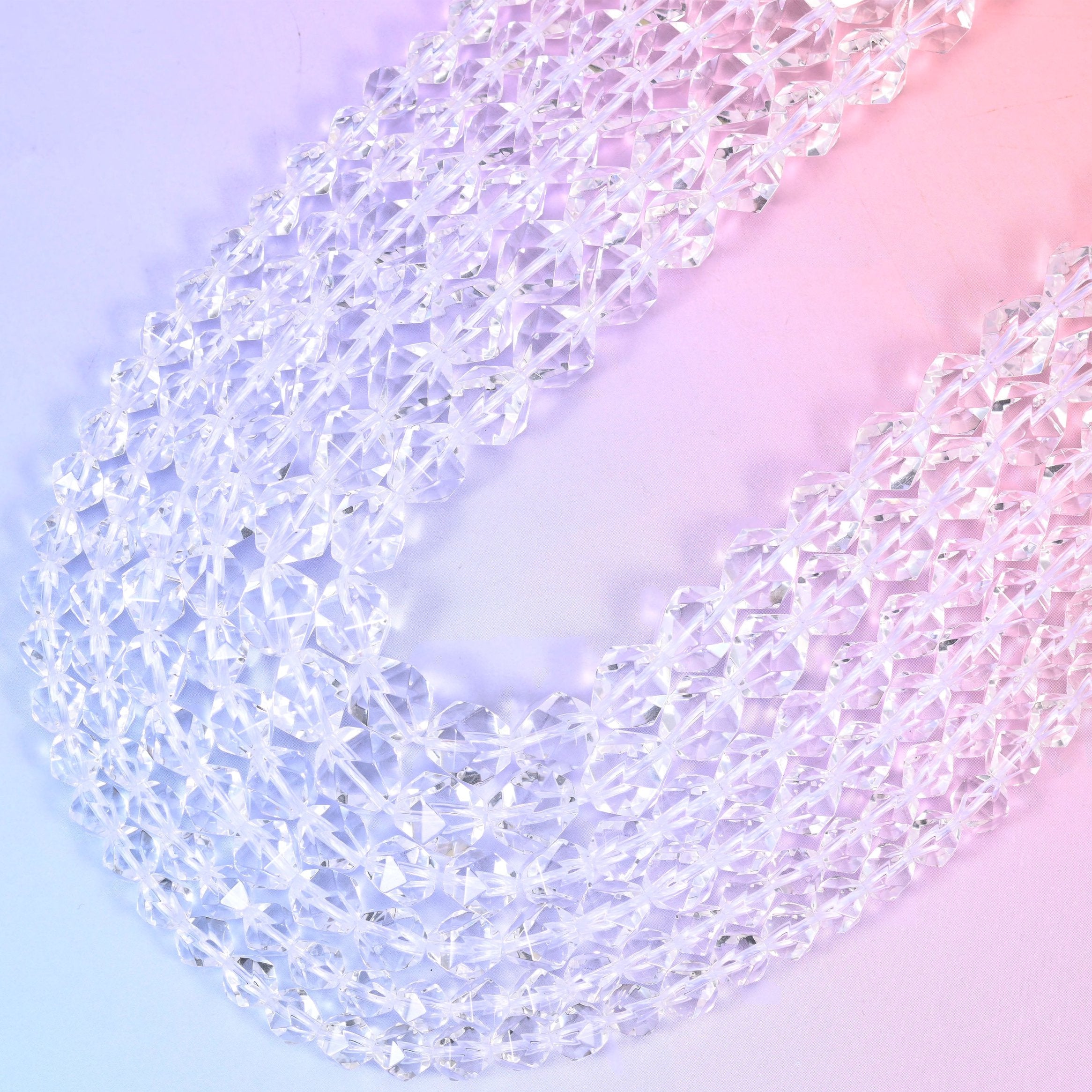 Clear Quartz diamond star cut beads, two 15.5 inch strands crossing