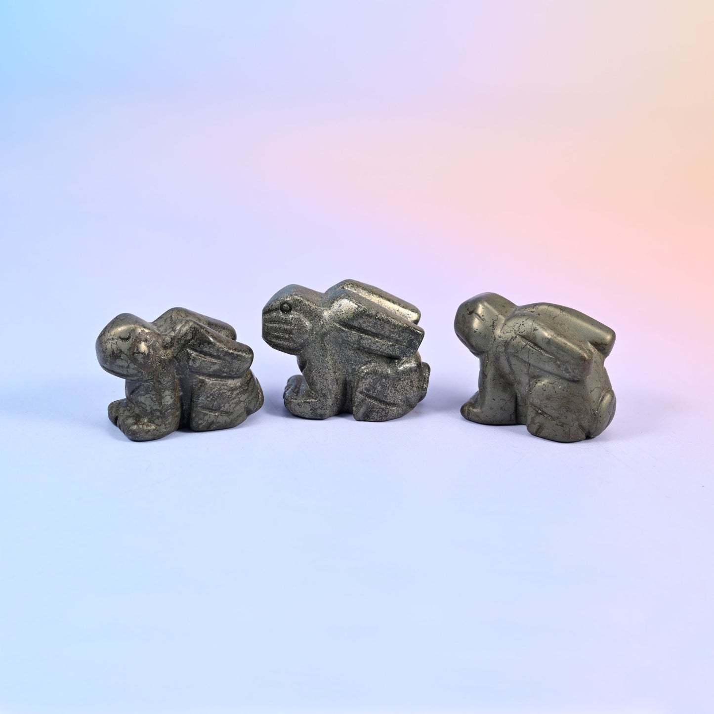 1.5 inch carved stone rabbit figurine, natural stone so veining and colour vary piece to piece