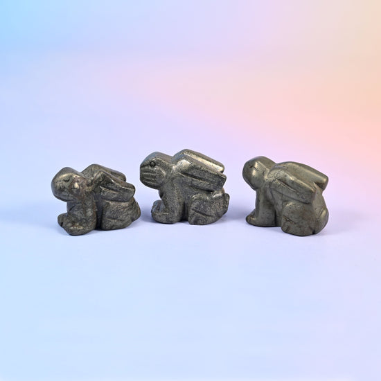 1.5 inch carved stone rabbit figurine, natural stone so veining and colour vary piece to piece