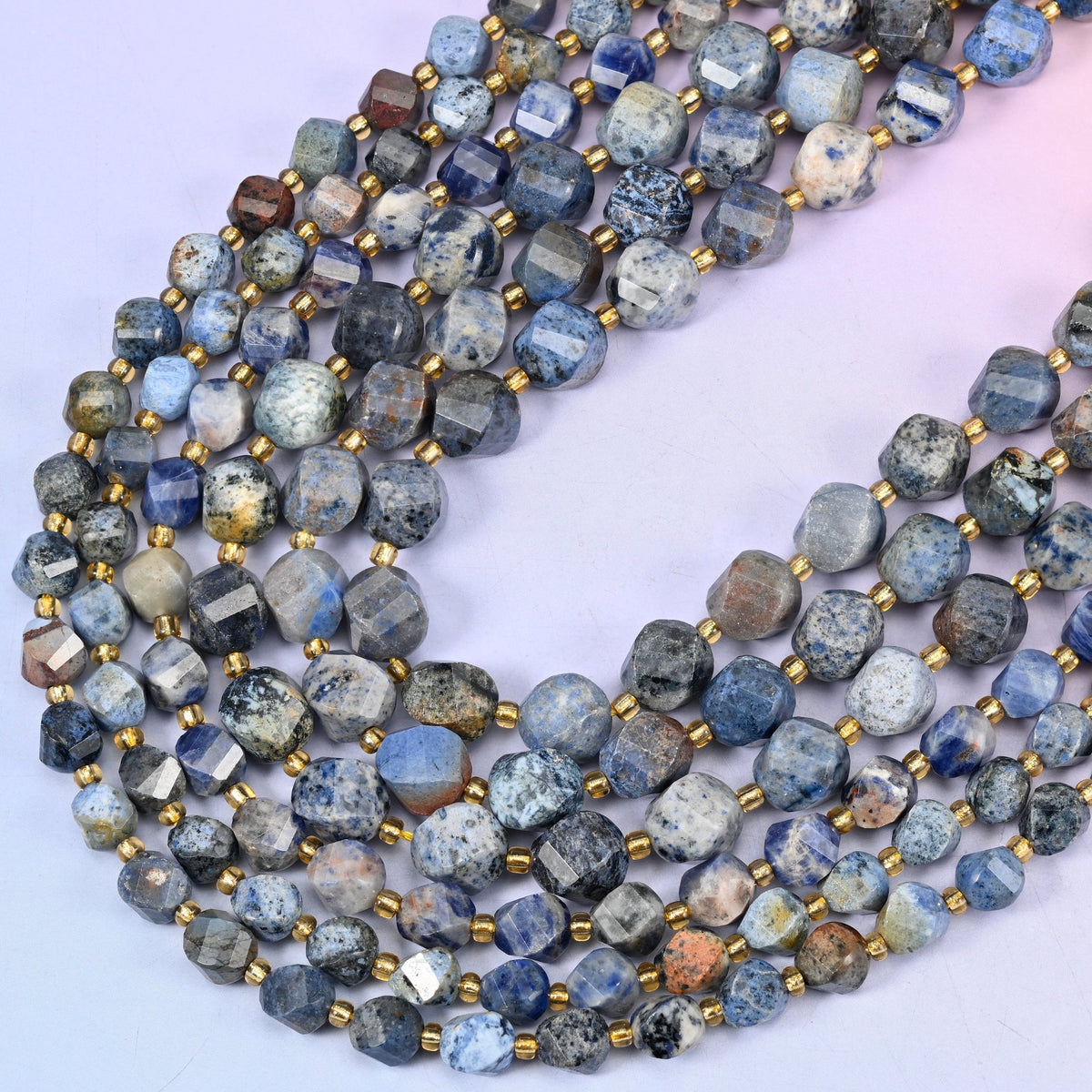 Sunset Dumortierite faceted spiral twist beads, 15 inch strand