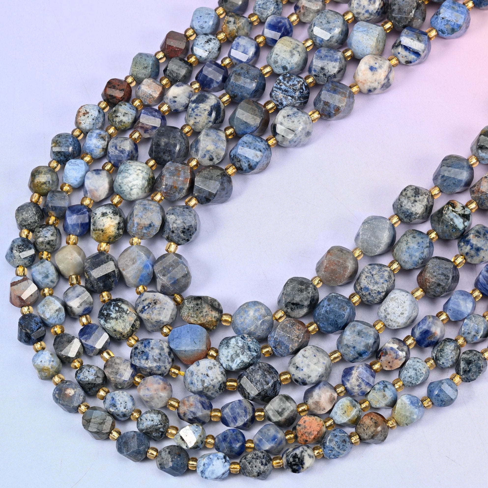 Sunset Dumortierite faceted spiral twist beads, 15 inch strand