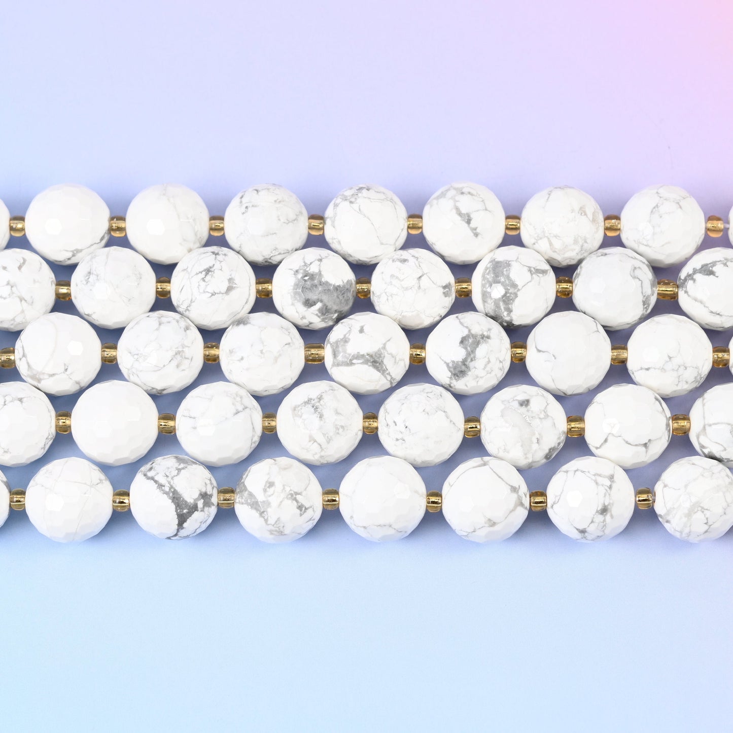 White howlite faceted round beads in chalky white with grey-charcoal veining