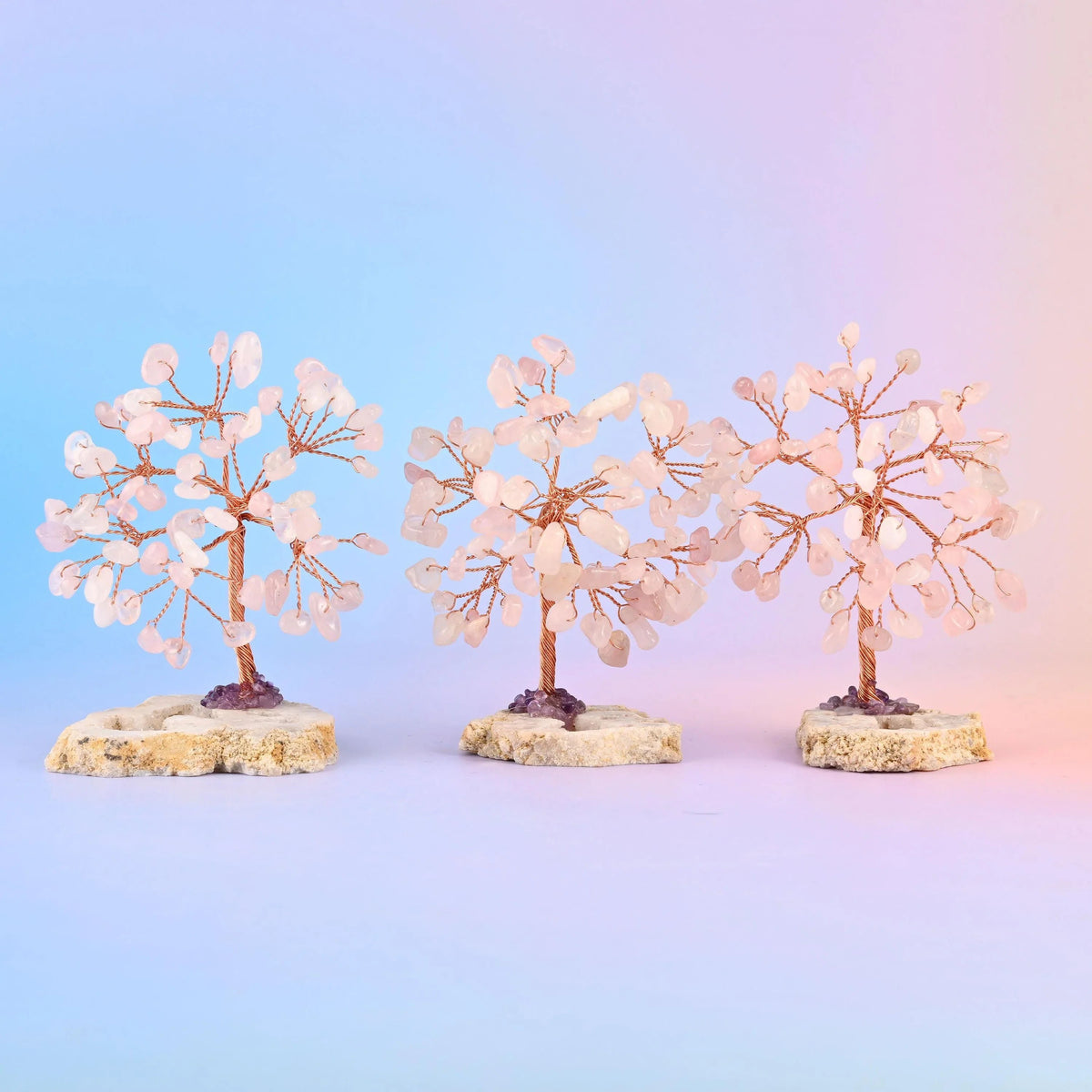 Gemstone tree canopy packed with tumbled gemstone chips on copper wire branches.