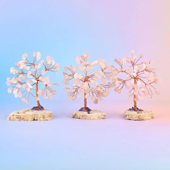 Gemstone tree canopy packed with tumbled gemstone chips on copper wire branches.
