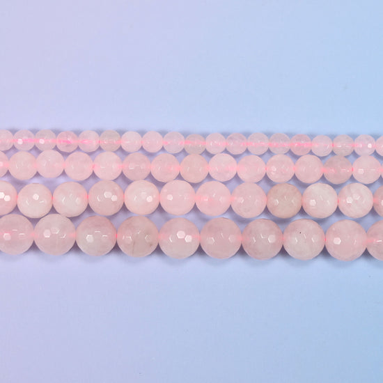 Rose quartz beads in pale blush pink, milky rather than clear