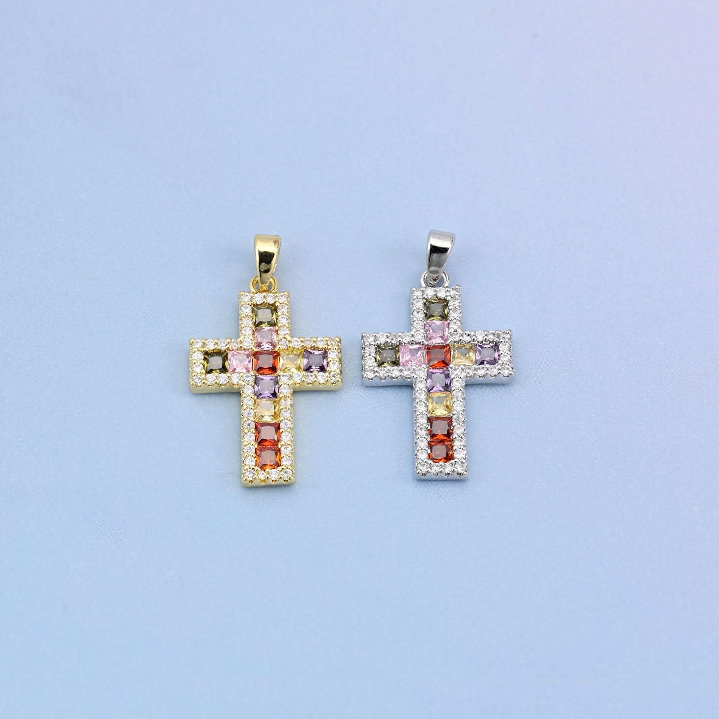 Zirconia cross charms in gold plated and white gold plated, the two finishes side by side