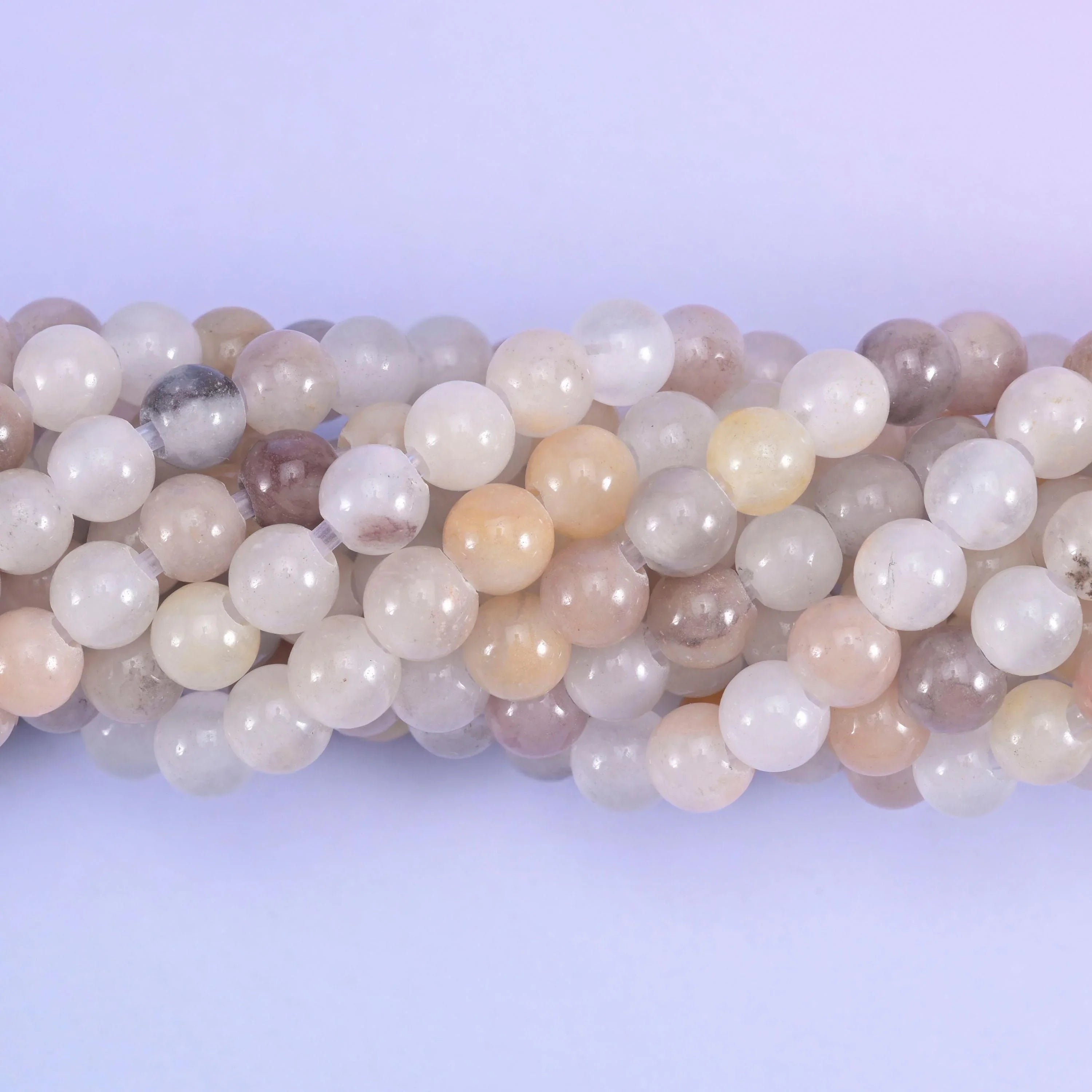 Smooth round cut lavender quartz beads