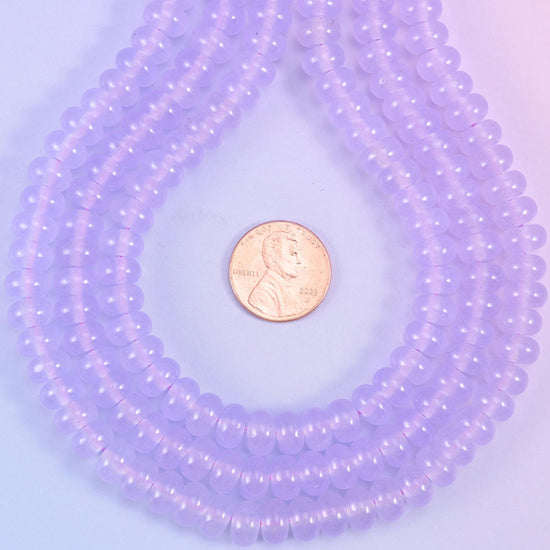 Lavender Purple Dyed Jade smooth rondelle beads in a soft, translucent lilac, finished with a smooth, polished surface