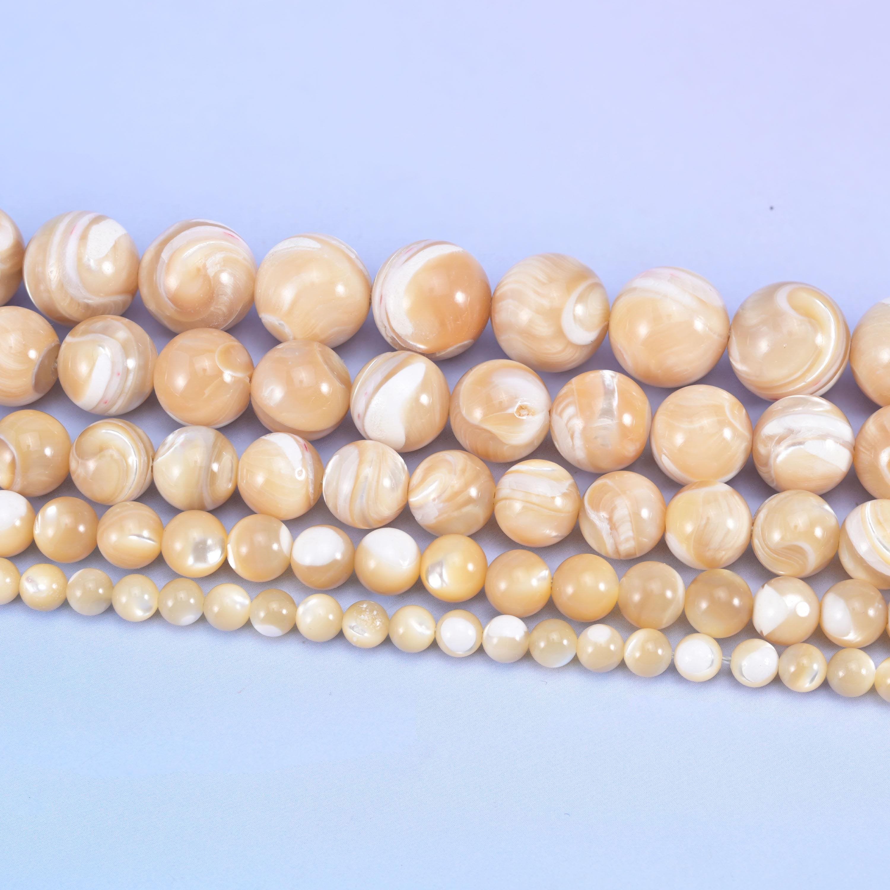 Smooth round cut trochus shell beads