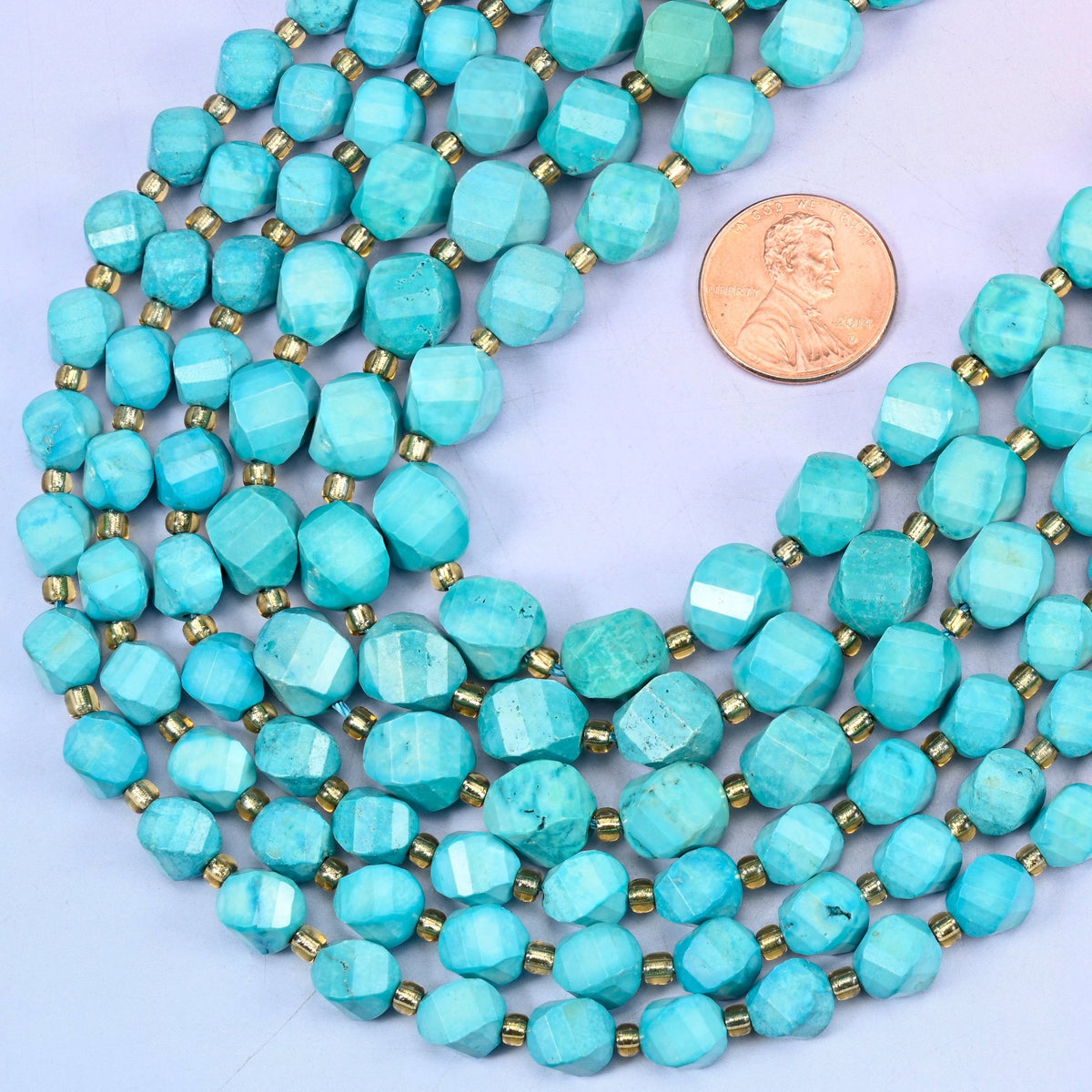 Faceted spiral twist cut Dyed Lake Blue Howlite beads