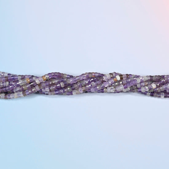 Strands of amethyst faceted heishi disc beads twisted together in a horizontal row