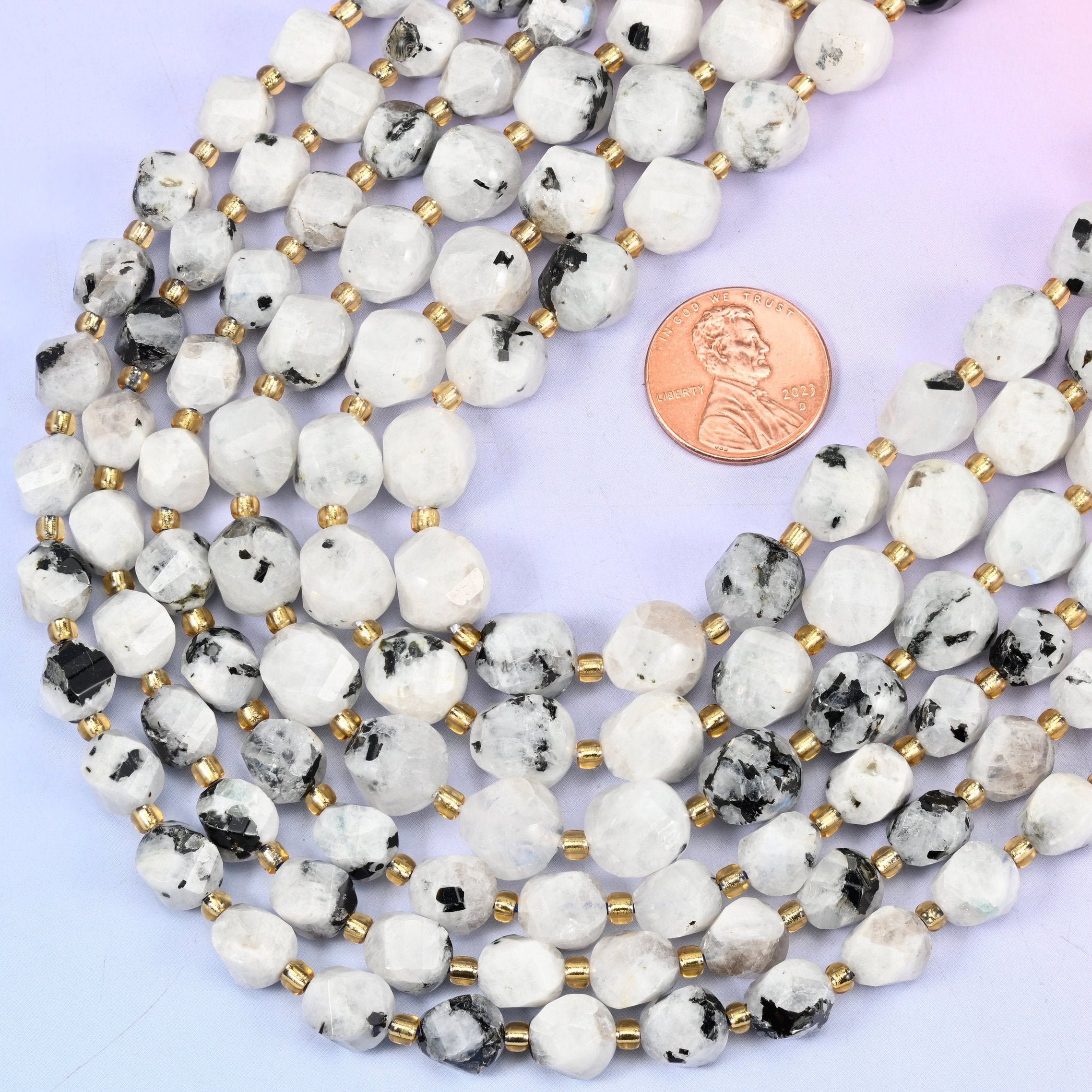 Faceted spiral twist cut blue moonstone beads