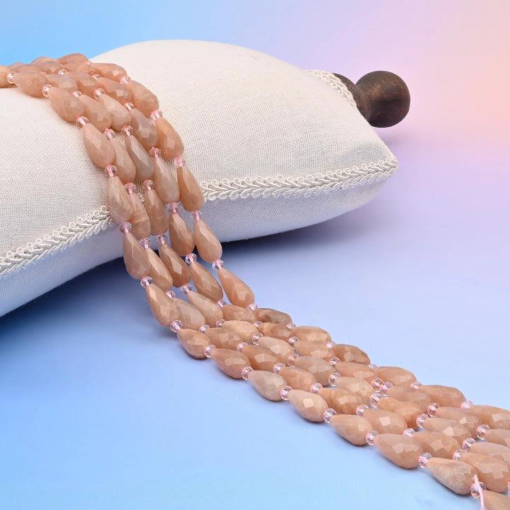 Natural Sunstone faceted teardrop beads, peach and warm tan with an internal shimmer