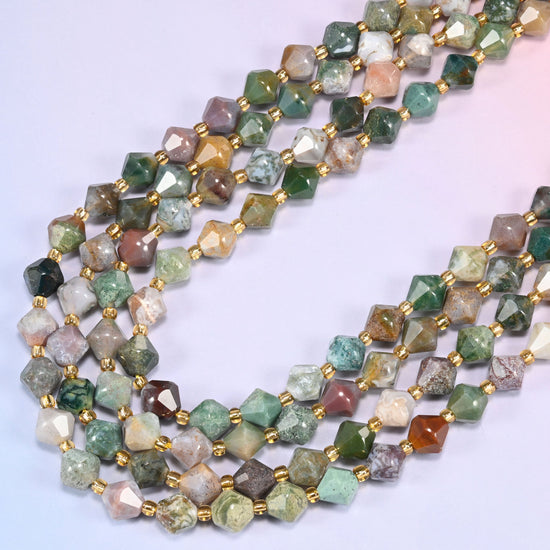 Indian Agate faceted bicone beads 8mm with gold-tone spacers, strand draped in a loose diagonal curve