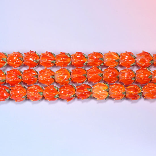 Tulip flower bud lampwork glass beads in orange with green leaf detail
