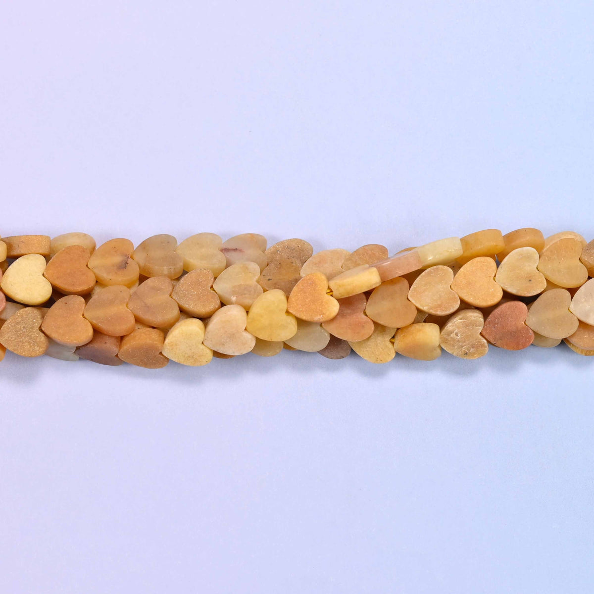 Matte Gold Silk Jade Flat Heart Beads, approximately 68 beads per strand