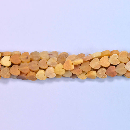 Matte Gold Silk Jade Flat Heart Beads, approximately 68 beads per strand