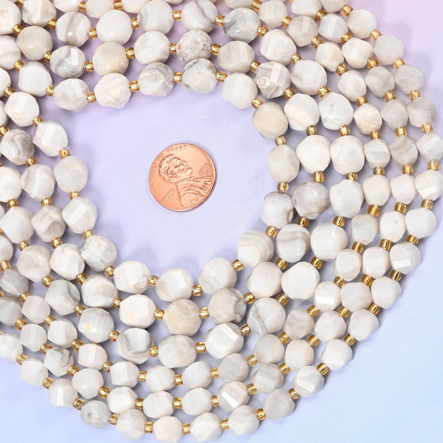 Natural Crazy Agate ranging from bright chalky white to warmer cream with grey swirls