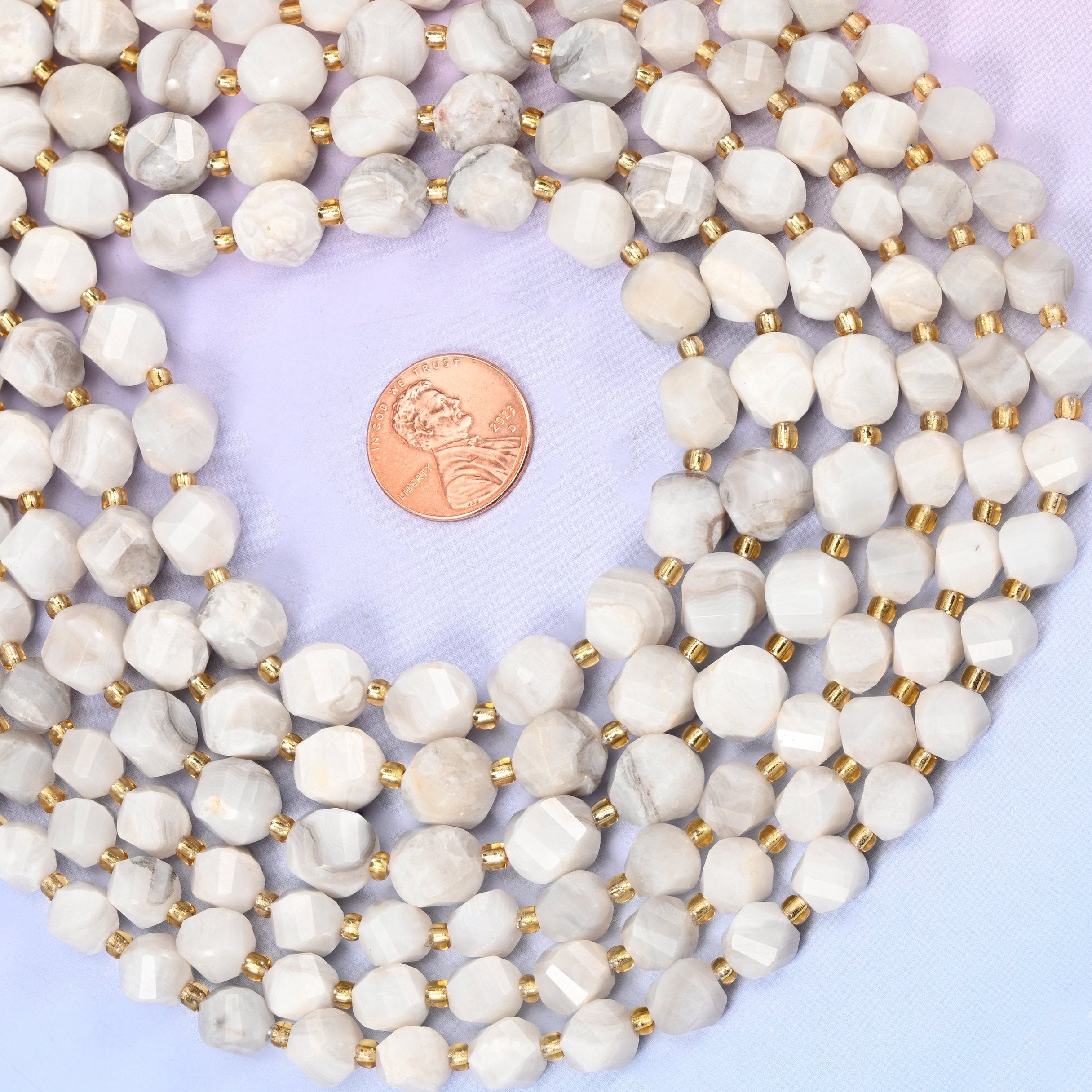 Natural Crazy Agate ranging from bright chalky white to warmer cream with grey swirls