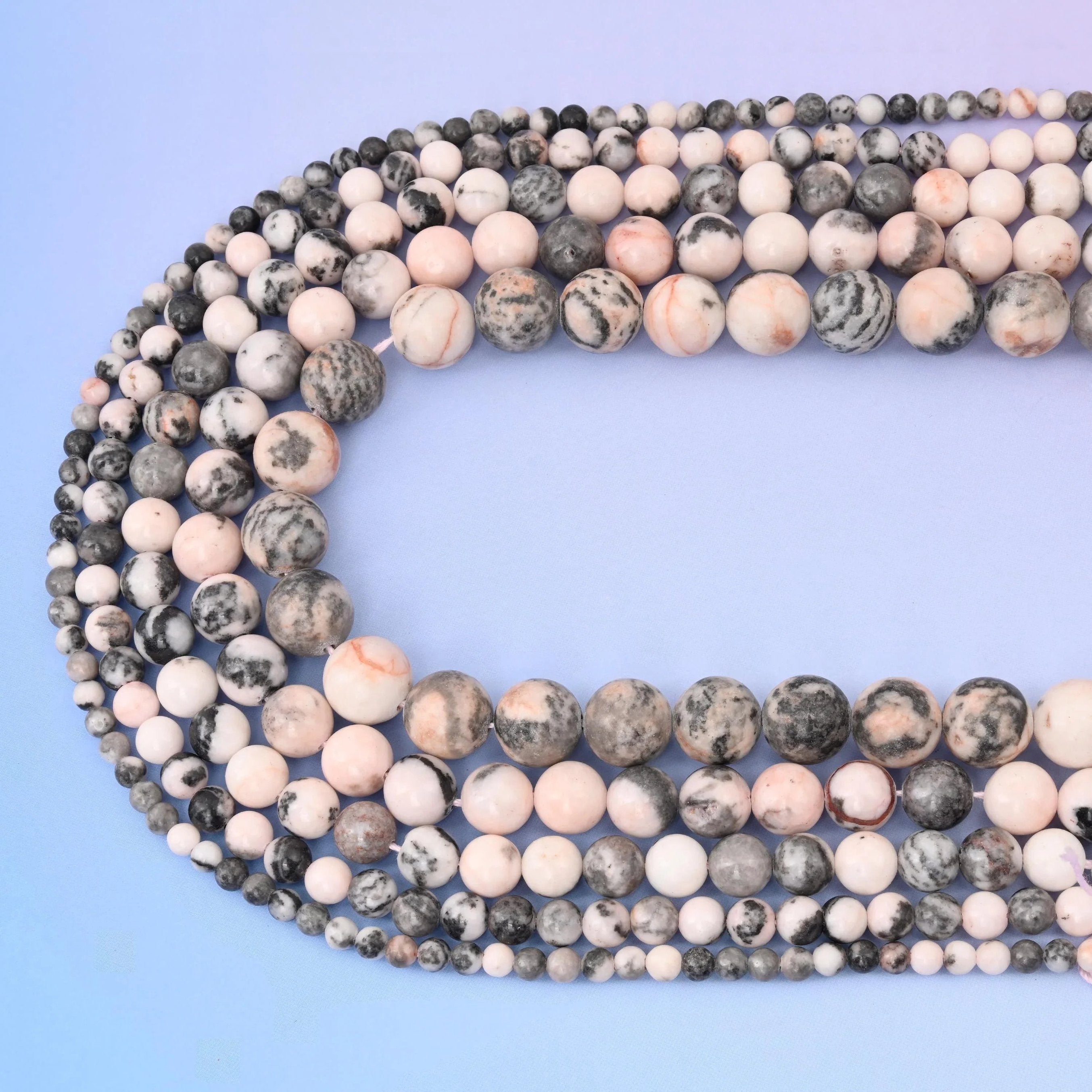 Pink Zebra Jasper beads in soft pink and charcoal grey stripes