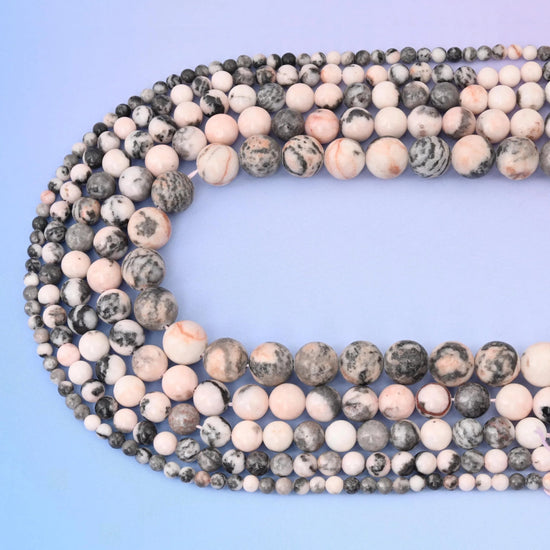 Pink Zebra Jasper beads in soft pink and charcoal grey stripes