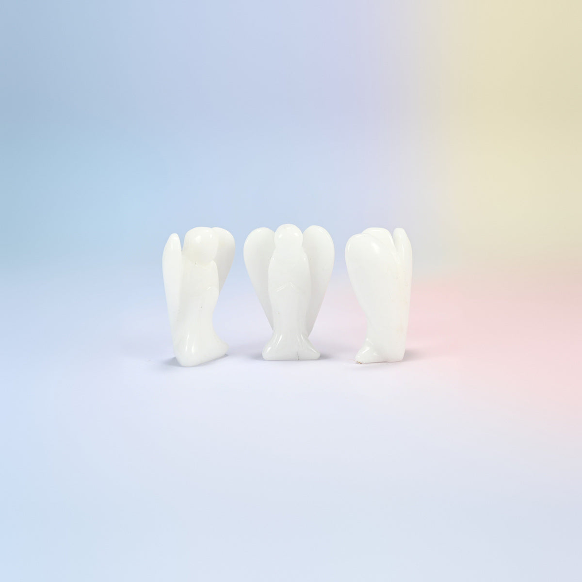 Three natural white jade guardian angel carvings, opaque white, 2 inch