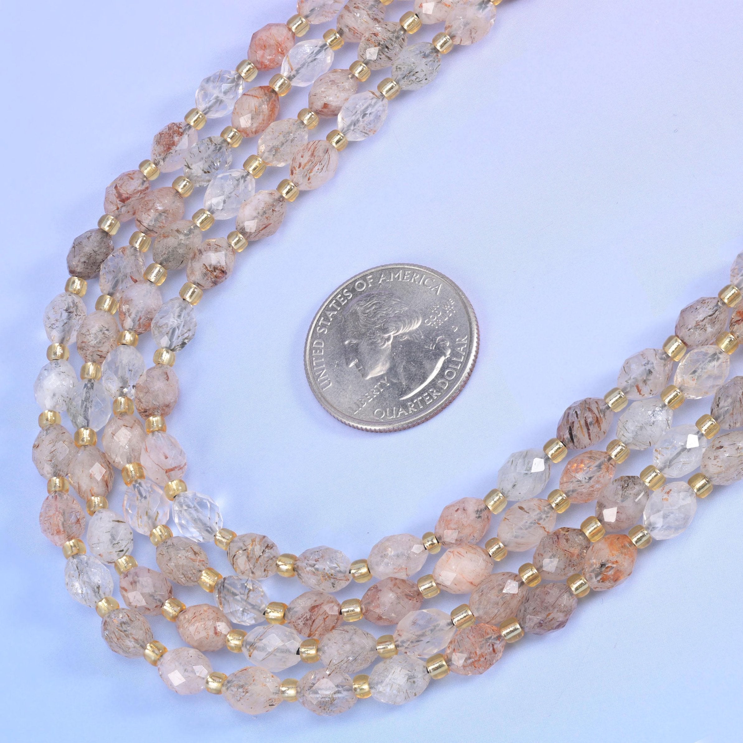 Red Copper Rutilated Quartz Rice Barrel Beads in milky pale quartz with copper rutile needles