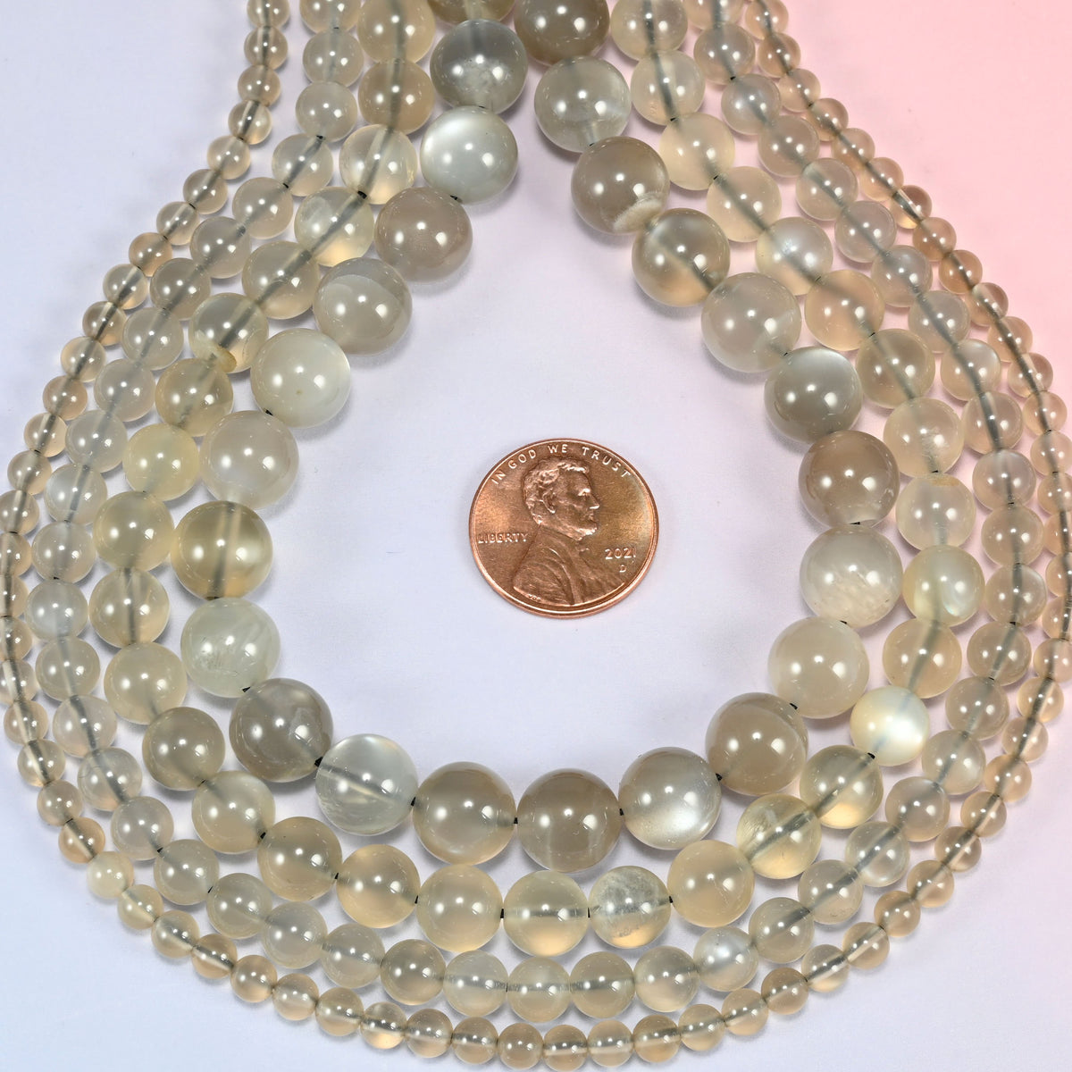 AAA Gray Labradorite smooth round beads in a deep teardrop loop, sold per 15 inch strand