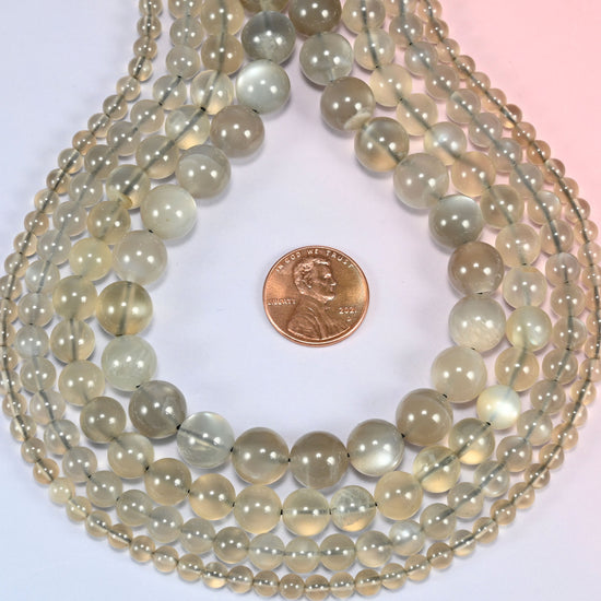 AAA Gray Labradorite smooth round beads in a deep teardrop loop, sold per 15 inch strand