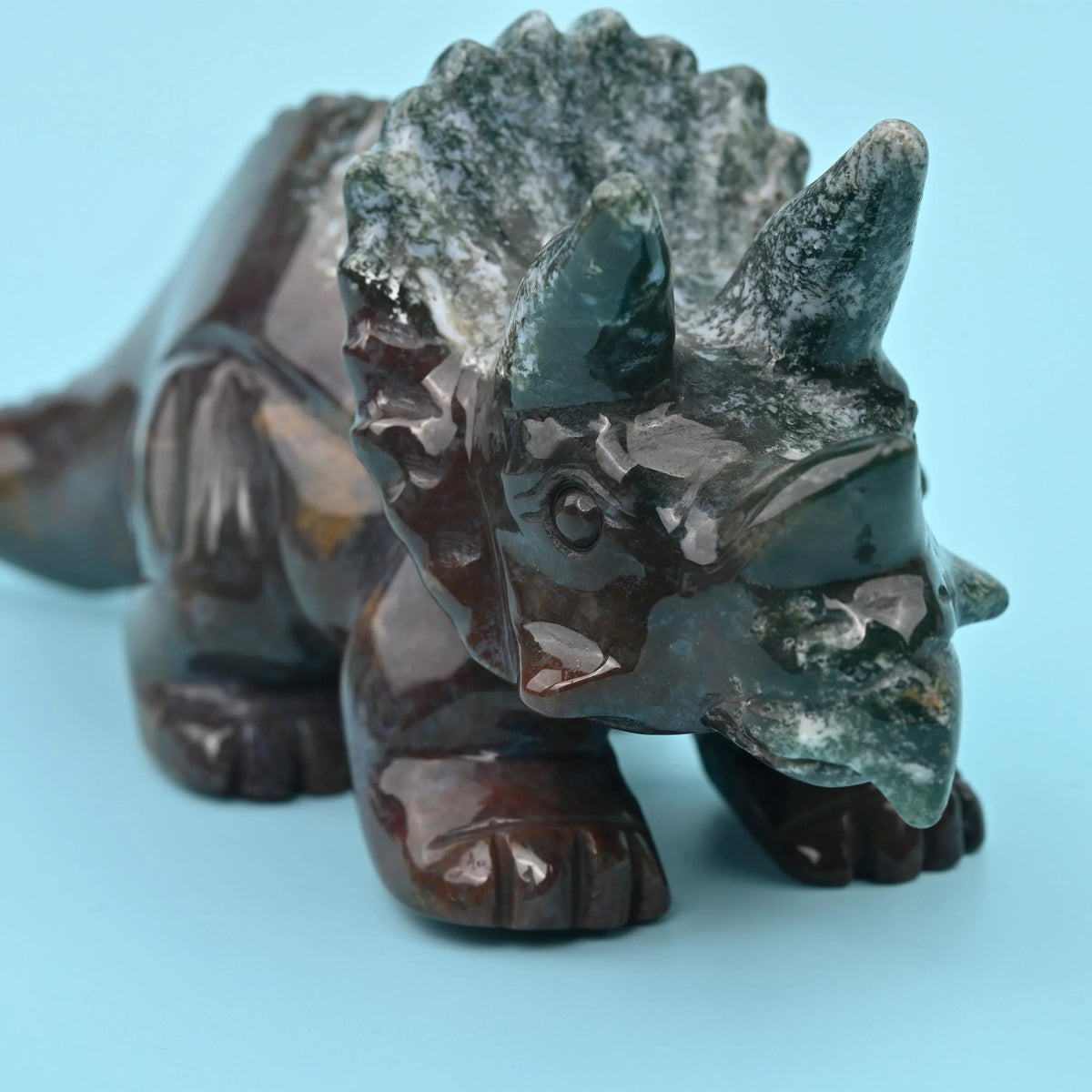 Hand-carved and hand-polished agate Triceratops figurine.