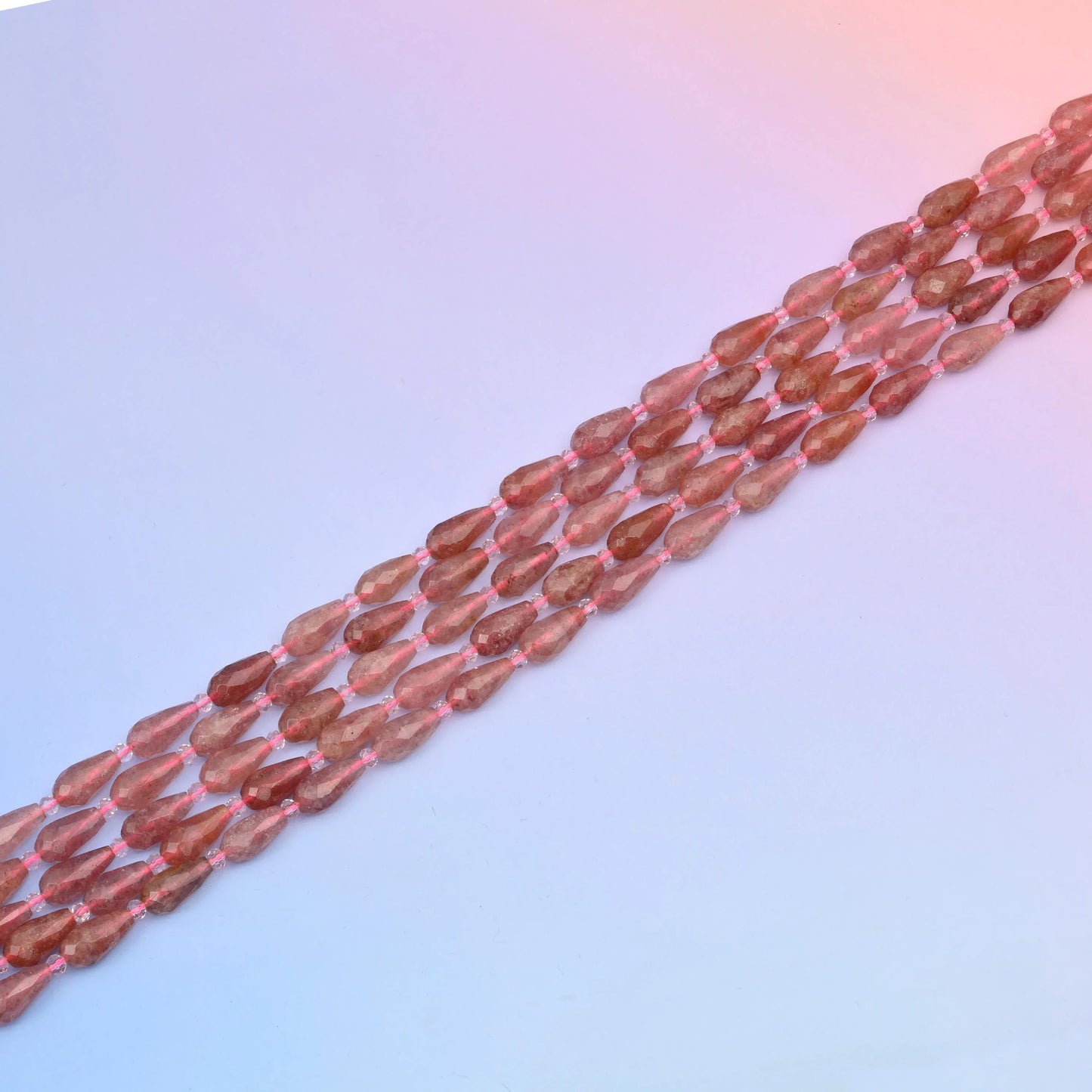 Faceted teardrop cut Pink Strawberry Quartz beads for jewellery making