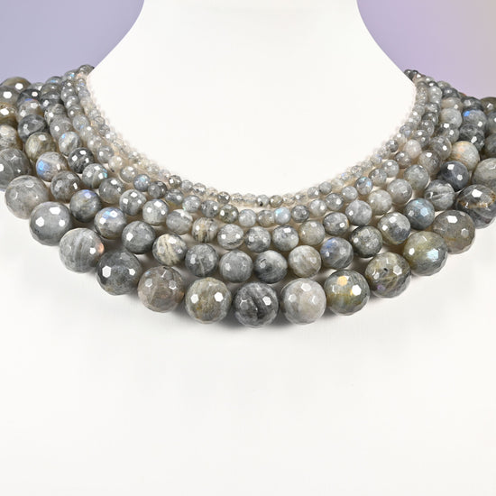 Gray Labradorite faceted round beads layered as a collar, several strands showing the 4mm through 14mm sizes together