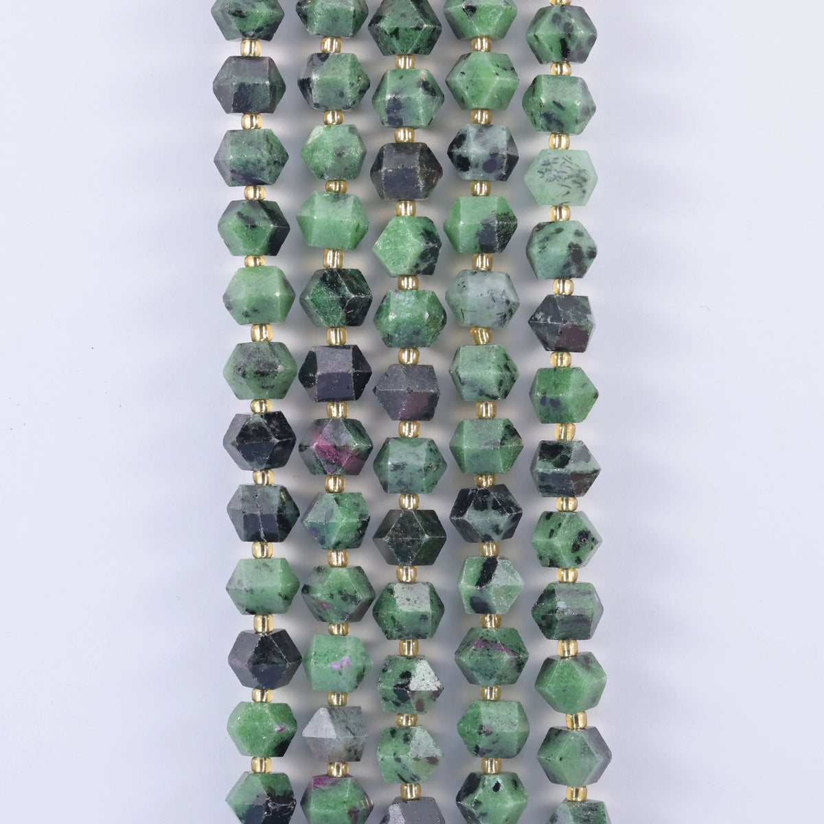 Faceted eight-sided rhombus beads, centre-drilled for beading wire and cord.